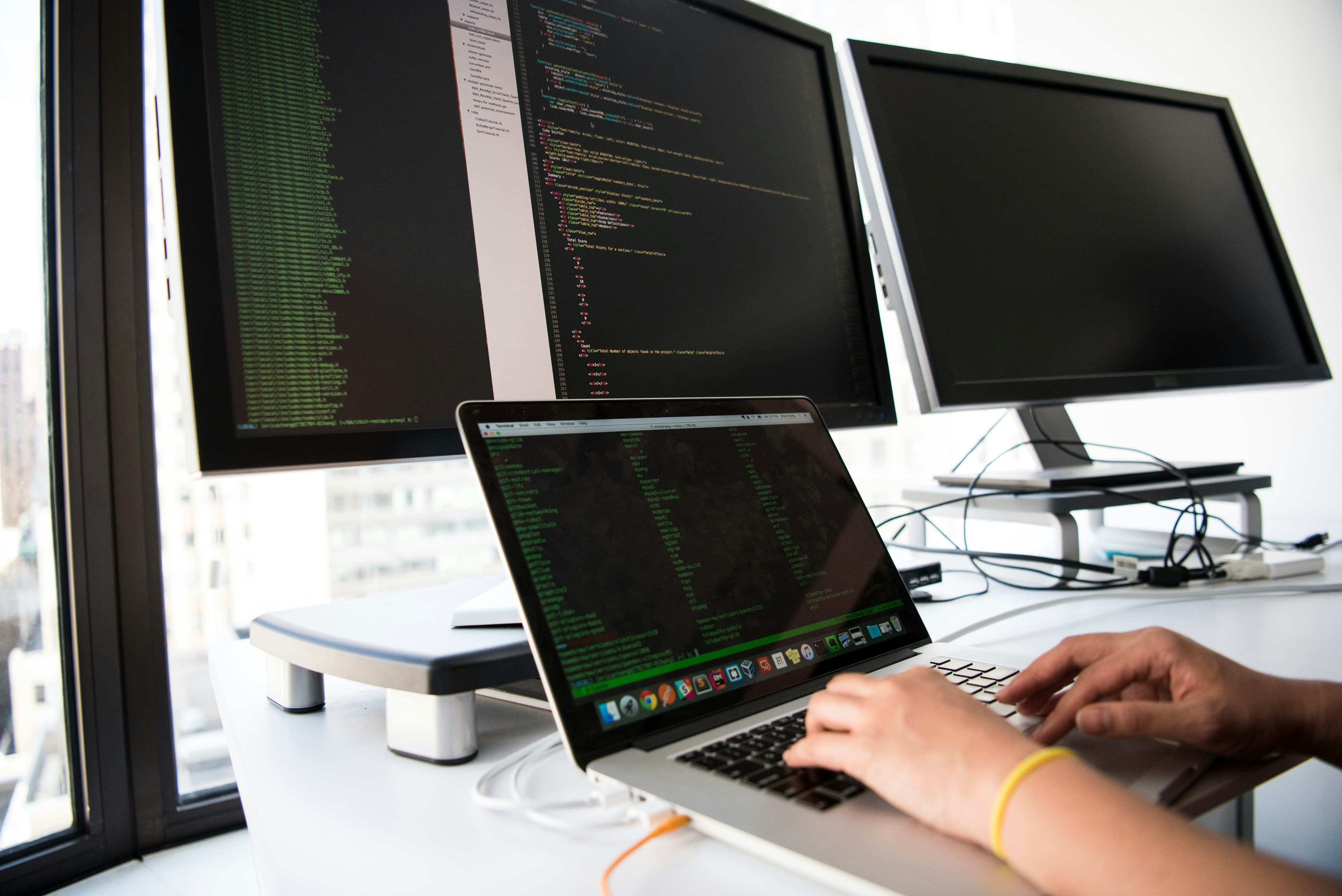 A technical team working together at a desk